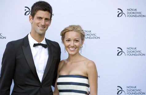 Serbian tennis player Novak Djokovic and his girlfriend Jelena Ristic pose for photographers as they arrive at a fundraising dinner for the Serbian tennis player Novak Djokovic and his girlfriend Jelena Ristic pose for photographers as they arrive at a fundraising dinner for the