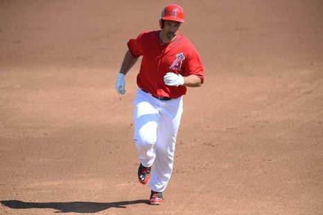 Mar 4, 2014; Tempe, AZ, USA; Los Angeles Angels outfielder Raul Ibanez runs the bases after hitting a home run against the Texas Rangers dur Mar 4, 2014; Tempe, AZ, USA; Los Angeles Angels outfielder Raul Ibanez runs the bases after hitting a home run against the Texas Rangers dur