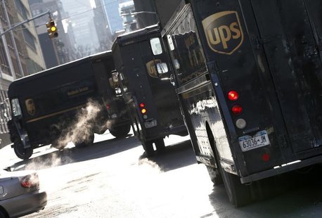 UPS delivery trucks are seen in New York City March 6, 2014. REUTERS/Mike Segar UPS delivery trucks are seen in New York City March 6, 2014. REUTERS/Mike Segar
