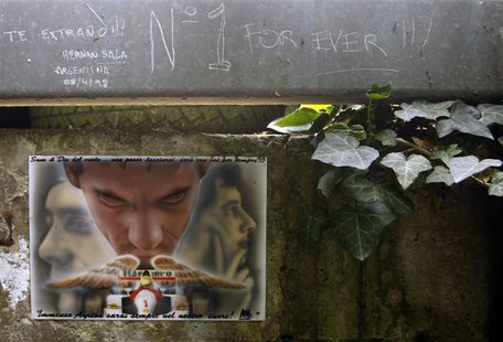 Handwritten notes left by fans are pictured on a fence at the site where Brazilian Formula One driver Ayrton Senna died at the race track in Handwritten notes left by fans are pictured on a fence at the site where Brazilian Formula One driver Ayrton Senna died at the race track in