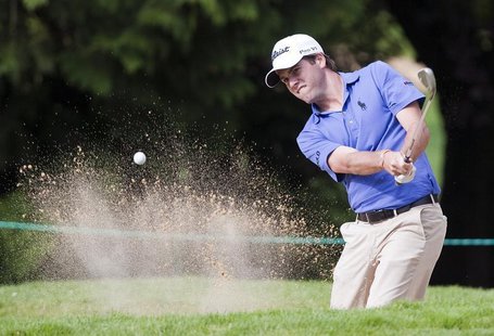 Ben Martin of the U.S hits out of the bunker on the 7th hole during the Canadian Open Golf Tournament at Shaughnessy Golf and Country Club i Ben Martin of the U.S hits out of the bunker on the 7th hole during the Canadian Open Golf Tournament at Shaughnessy Golf and Country Club i