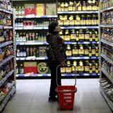 A customer looks at items displayed on shelves at a supermarket in Shenyang, Liaoning province April 11, 2014. REUTERS/Stringer A customer looks at items displayed on shelves at a supermarket in Shenyang, Liaoning province April 11, 2014. REUTERS/Stringer