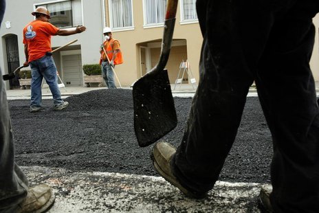 Workers spread asphalt on a street in the Cow Hollow neighborhood in San Francisco, California June 2, 2010. REUTERS/Robert Galbraith Workers spread asphalt on a street in the Cow Hollow neighborhood in San Francisco, California June 2, 2010. REUTERS/Robert Galbraith