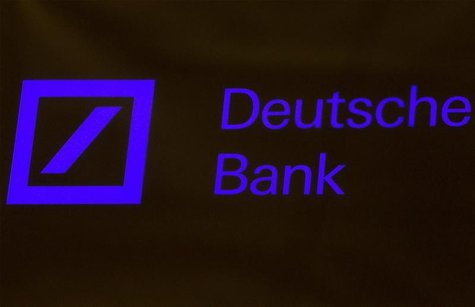 A Deutsche Bank sign is seen on the floor of the New York Stock Exchange January 15, 2014. REUTERS/Brendan McDermid A Deutsche Bank sign is seen on the floor of the New York Stock Exchange January 15, 2014. REUTERS/Brendan McDermid
