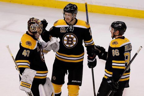 Apr 20, 2014; Boston, MA, USA; Boston Bruins defenseman Dougie Hamilton (27) and defenseman Kevan Miller (86) congratulates Boston Bruins go Apr 20, 2014; Boston, MA, USA; Boston Bruins defenseman Dougie Hamilton (27) and defenseman Kevan Miller (86) congratulates Boston Bruins go