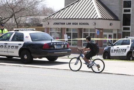 Police guard the front of Jonathan Law High School in Milford, Connecticut April 25, 2014. CREDIT: REUTERS/MICHELLE MCLOUGHLIN Police guard the front of Jonathan Law High School in Milford, Connecticut April 25, 2014. CREDIT: REUTERS/MICHELLE MCLOUGHLIN