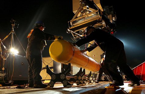 The Phoenix International Autonomous Underwater Vehicle (AUV) Artemis, also known as the Bluefin-21, is prepared for deployment from the Aus The Phoenix International Autonomous Underwater Vehicle (AUV) Artemis, also known as the Bluefin-21, is prepared for deployment from the Aus
