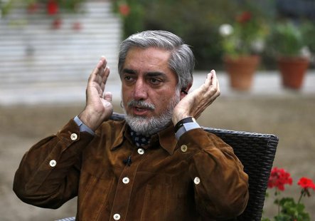 Afghan presidential candidate Abdullah Abdullah adjusts his headphones before an interview in Kabul April 24, 2014. REUTERS/Mohammad Ismail Afghan presidential candidate Abdullah Abdullah adjusts his headphones before an interview in Kabul April 24, 2014. REUTERS/Mohammad Ismail