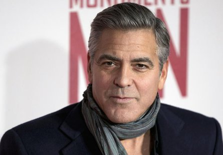 Actor and director George Clooney arrives for the UK premiere of his film "The Monuments Men" in London February 11, 2014. REUTERS/Neil Hall Actor and director George Clooney arrives for the UK premiere of his film "The Monuments Men" in London February 11, 2014. REUTERS/Neil Hall