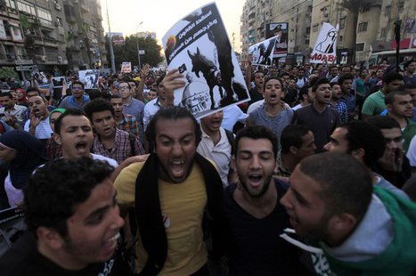 Demonstrators shout slogans against the government and Egypt's former army chief Abdel Fattah al-Sisi near El-Thadiya presidential palace in Demonstrators shout slogans against the government and Egypt's former army chief Abdel Fattah al-Sisi near El-Thadiya presidential palace in