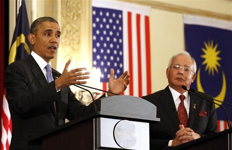U.S. President Barack Obama speaks next to Malaysian Prime Minister Najib Razak during joint news conference at the Perdana Putra Building i U.S. President Barack Obama speaks next to Malaysian Prime Minister Najib Razak during joint news conference at the Perdana Putra Building i