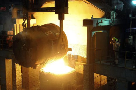 Workers look at a ladle pouring molten iron into a container at a steel plant in Hangzhou, Zhejiang province in this May 30, 2012 file photo Workers look at a ladle pouring molten iron into a container at a steel plant in Hangzhou, Zhejiang province in this May 30, 2012 file photo
