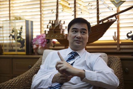 Thailand's opposition leader and former Prime Minister Abhisit Vejjajiva gestures during an interview with foreign media at his Democrat Par Thailand's opposition leader and former Prime Minister Abhisit Vejjajiva gestures during an interview with foreign media at his Democrat Par