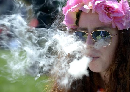 A woman smokes marijuana during the 4/20 Rally at the Civic Center in Denver, Colorado, April 20, 2014. REUTERS/Mark Leffingwell A woman smokes marijuana during the 4/20 Rally at the Civic Center in Denver, Colorado, April 20, 2014. REUTERS/Mark Leffingwell