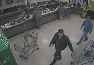 Break-in suspects walking in store (courtesy Michigan State Police) Break-in suspects walking in store (courtesy Michigan State Police)