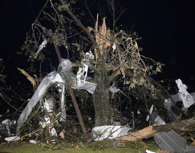 Debris hangs from a tree after a tornado hit the town of Mayflower, Arkansas around 7:30 pm CST, late April 27, 2014.
CREDIT: REUTERS/GENE BLEVINS Debris hangs from a tree after a tornado hit the town of Mayflower, Arkansas around 7:30 pm CST, late April 27, 2014.
CREDIT: REUTERS/GENE BLEVINS