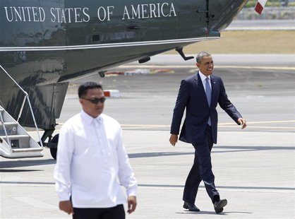 U.S. President Barack Obama walks towards to Air Force One during his departure at Manila international airport April 29, 2014. REUTERS/Rome U.S. President Barack Obama walks towards to Air Force One during his departure at Manila international airport April 29, 2014. REUTERS/Rome