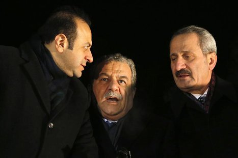 Turkey's European Affairs Minister Egemen Bagis (L), Interior Minister Muammer Guler and Economy Minister Zafer Caglayan (R) chat as they wa Turkey's European Affairs Minister Egemen Bagis (L), Interior Minister Muammer Guler and Economy Minister Zafer Caglayan (R) chat as they wa
