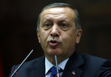 Turkey's Prime Minister Tayyip Erdogan addresses members of parliament from his ruling AK Party (AKP) during a meeting at the Turkish parlia Turkey's Prime Minister Tayyip Erdogan addresses members of parliament from his ruling AK Party (AKP) during a meeting at the Turkish parlia