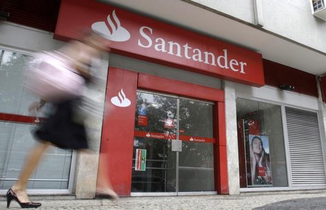A woman walks past Santander bank branch in Rio de Janeiro October 7, 2009. REUTERS/Sergio Moraes A woman walks past Santander bank branch in Rio de Janeiro October 7, 2009. REUTERS/Sergio Moraes
