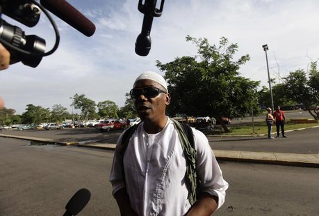 William Potts speaks to reporters outside Havana's Jose Marti International Airport, before boarding a plane to the U.S. November 6, 2013. R William Potts speaks to reporters outside Havana's Jose Marti International Airport, before boarding a plane to the U.S. November 6, 2013. R