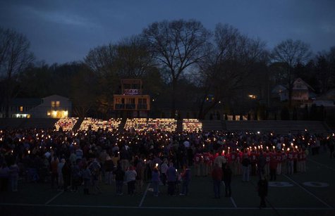 People gather at Jonathan Law High School during a vigil for slain student Maren Sanchez in Milford, Connecticut April 28, 2014. REUTERS/Mic People gather at Jonathan Law High School during a vigil for slain student Maren Sanchez in Milford, Connecticut April 28, 2014. REUTERS/Mic