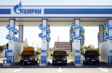 Vehicles are seen at a gas filling station, owned by Gazprom Transgaz Stavropol, with the company logo of Russian natural gas producer Gazpr Vehicles are seen at a gas filling station, owned by Gazprom Transgaz Stavropol, with the company logo of Russian natural gas producer Gazpr