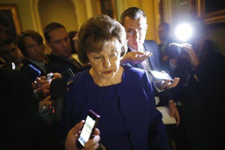 U.S. Senator Dianne Feinstein (D-CA) is trailed by reporters as she walks to the weekly Democratic caucus policy luncheon at the U.S. Capito U.S. Senator Dianne Feinstein (D-CA) is trailed by reporters as she walks to the weekly Democratic caucus policy luncheon at the U.S. Capito