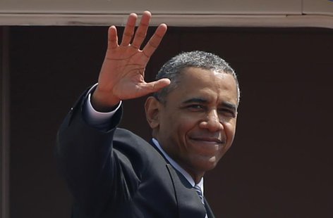 U.S. President Barack Obama waves from Air Force One as he departs Haneda International Airport in Tokyo April 25, 2014. REUTERS/Yuya Shino U.S. President Barack Obama waves from Air Force One as he departs Haneda International Airport in Tokyo April 25, 2014. REUTERS/Yuya Shino