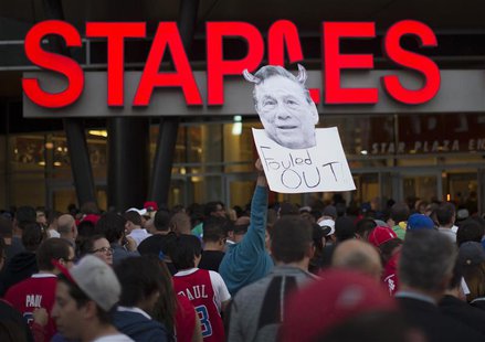 A photo cutout of Los Angeles Clippers owner Donald Sterling is seen among people standing in line for the NBA playoff game 5 between Golden A photo cutout of Los Angeles Clippers owner Donald Sterling is seen among people standing in line for the NBA playoff game 5 between Golden