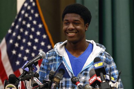 Kwasi Enin, a high school senior, smiles after announcing he will attend Yale University during a press conference at William Floyd High Sch Kwasi Enin, a high school senior, smiles after announcing he will attend Yale University during a press conference at William Floyd High Sch