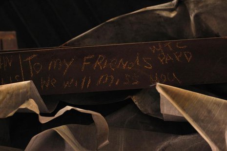 A message is seen on the bottom of the "Cross", intersecting steel beams found in the rubble of 6 World Trade Center that was destroyed on S A message is seen on the bottom of the "Cross", intersecting steel beams found in the rubble of 6 World Trade Center that was destroyed on S