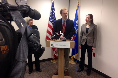 Outagamie County Executive Tom Nelson introduces interim emergency management director Christina Muller (right), April 30, 2014, at the county administration building in Appleton. (Photo from: FOX 11) Outagamie County Executive Tom Nelson introduces interim emergency management director Christina Muller (right), April 30, 2014, at the county administration building in Appleton. (Photo from: FOX 11)