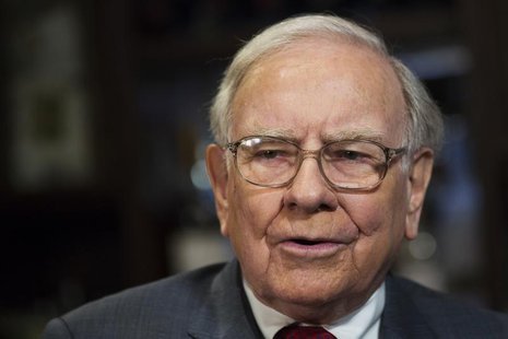 Investor Warren Buffett poses for a portrait during an interview after a luncheon to benefit the Glide Foundation of San Francisco in New Yo Investor Warren Buffett poses for a portrait during an interview after a luncheon to benefit the Glide Foundation of San Francisco in New Yo