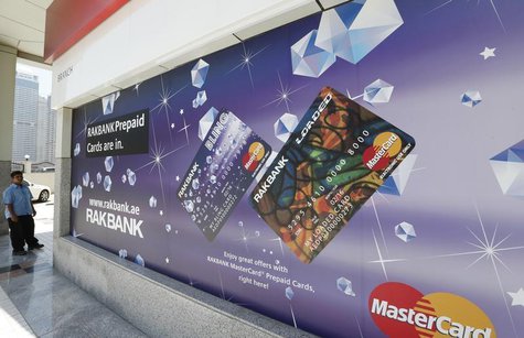 A sign displaying ATM prepaid cards is seen at a RAKBANK branch at Dubai Marina in Dubai May 12, 2013. REUTERS/Ahmed Jadallah A sign displaying ATM prepaid cards is seen at a RAKBANK branch at Dubai Marina in Dubai May 12, 2013. REUTERS/Ahmed Jadallah