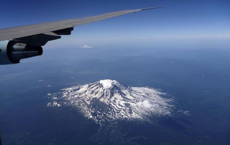 Mt. Saint Helens is seen under the right wing of Air Force One while heading away from Seattle in Washington, July 25, 2012. REUTERS/Larry D Mt. Saint Helens is seen under the right wing of Air Force One while heading away from Seattle in Washington, July 25, 2012. REUTERS/Larry D