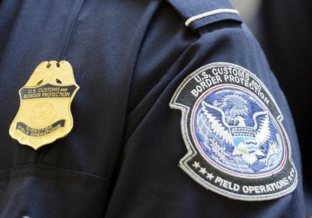 A U.S. Customs and Border Protection arm patch and badge is seen at Los Angeles International Airport, California February 20, 2014. REUTERS A U.S. Customs and Border Protection arm patch and badge is seen at Los Angeles International Airport, California February 20, 2014. REUTERS