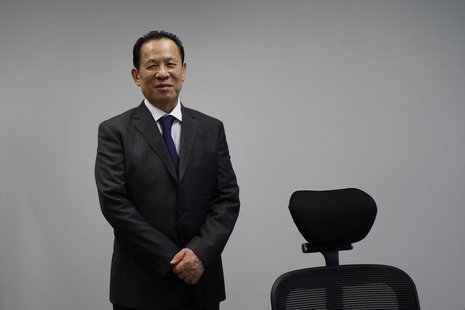 Universal Entertainment Corporation CEO Kazuo Okada poses during an interview in Hong Kong October 30, 2012. REUTERS/Bobby Yip Universal Entertainment Corporation CEO Kazuo Okada poses during an interview in Hong Kong October 30, 2012. REUTERS/Bobby Yip