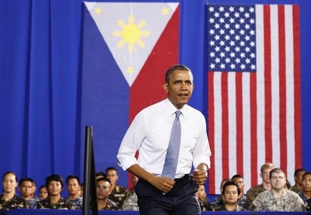U.S. President Barack Obama walks out to speak to military troops at the Fort Bonifacio Gymnasium in Manila, April 29, 2014. Obama said a ne U.S. President Barack Obama walks out to speak to military troops at the Fort Bonifacio Gymnasium in Manila, April 29, 2014. Obama said a ne
