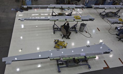 A worker assembles a wing flap for the Boeing 737-900 at their operations in Renton, Washington, October 18, 2012. REUTERS/Andy Clark A worker assembles a wing flap for the Boeing 737-900 at their operations in Renton, Washington, October 18, 2012. REUTERS/Andy Clark