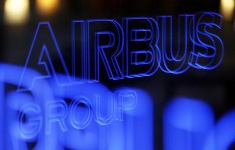 The logo of Airbus Group is reflected in a window during the Airbus Group 2013 annual results presentation in Toulouse February 26, 2014. RE The logo of Airbus Group is reflected in a window during the Airbus Group 2013 annual results presentation in Toulouse February 26, 2014. RE