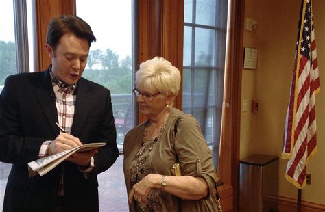 Democratic nominee Clay Aiken signs an autograph for a constituent after a campaign forum in Cary, North Carolina, April 28, 2014. REUTERS/C Democratic nominee Clay Aiken signs an autograph for a constituent after a campaign forum in Cary, North Carolina, April 28, 2014. REUTERS/C