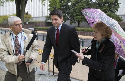 U.S. Representative Paul Ryan (R-WI) (C) talks to reporters as he departs a Republican House caucus meeting on Capitol Hill in Washington Ap U.S. Representative Paul Ryan (R-WI) (C) talks to reporters as he departs a Republican House caucus meeting on Capitol Hill in Washington Ap