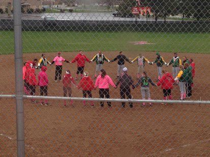 Coldwater and Pennfield softball players during Coldwater's "Strike Out Cancer" night, May 1, 2014 Coldwater and Pennfield softball players during Coldwater's "Strike Out Cancer" night, May 1, 2014