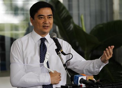 Thailand's opposition leader and former Prime Minister Abhisit Vejjajiva gestures during a news conference at the Royal Thai Armed Forces Co Thailand's opposition leader and former Prime Minister Abhisit Vejjajiva gestures during a news conference at the Royal Thai Armed Forces Co