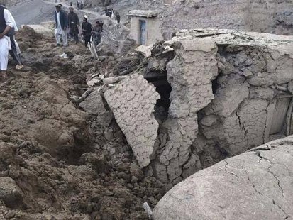 Afghan villagers gather at the site of a landslide at the Argo district in Badakhshan province, May 2, 2014. CREDIT: REUTERS/STRINGER Afghan villagers gather at the site of a landslide at the Argo district in Badakhshan province, May 2, 2014. CREDIT: REUTERS/STRINGER
