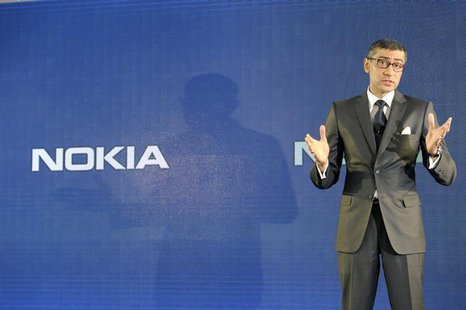 Nokia CEO Rajeev Suri speaks during a news conference to announce its first quarter earnings in Espoo April 29, 2014. REUTERS/Heikki Saukkom Nokia CEO Rajeev Suri speaks during a news conference to announce its first quarter earnings in Espoo April 29, 2014. REUTERS/Heikki Saukkom