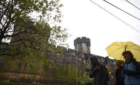 Pedestrians pass in front of the now-closed Eastern State Penitentiary in Philadelphia, Pennsylvania April 30, 2014. REUTERS/Mark Makela Pedestrians pass in front of the now-closed Eastern State Penitentiary in Philadelphia, Pennsylvania April 30, 2014. REUTERS/Mark Makela