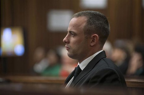 Olympic and Paralympic track star Oscar Pistorius sits in the dock in the North Gauteng High Court in Pretoria May 5, 2014. REUTERS/Ihsaan H Olympic and Paralympic track star Oscar Pistorius sits in the dock in the North Gauteng High Court in Pretoria May 5, 2014. REUTERS/Ihsaan H