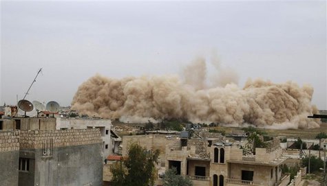 Debris rises in what Free Syrian Army fighters and Islamic rebels said was an operation to strike Al-Sahaba checkpoint, which is considered Debris rises in what Free Syrian Army fighters and Islamic rebels said was an operation to strike Al-Sahaba checkpoint, which is considered